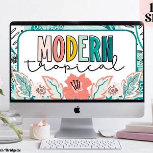 May include: A computer screen displaying a digital design with the text "MODERN tropical" in colorful letters. The design features tropical leaves and flowers in shades of green, pink, and blue.