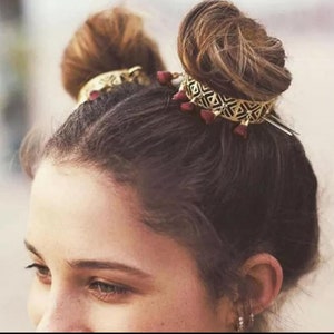 Bun holder/clip with hairpin and tassels