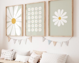 May include: A white bench with six storage bins, a giraffe toy, and three framed prints of daisies on a light green background.