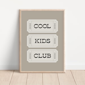 Typography wall art featuring three stacked ticket style designs with the words “Cool Kids Club” in bold black lettering on a neutral taupe background. Minimalist modern graphic print with a playful, retro inspired feel. This listing is for a digital download only. No physical print or frame included.