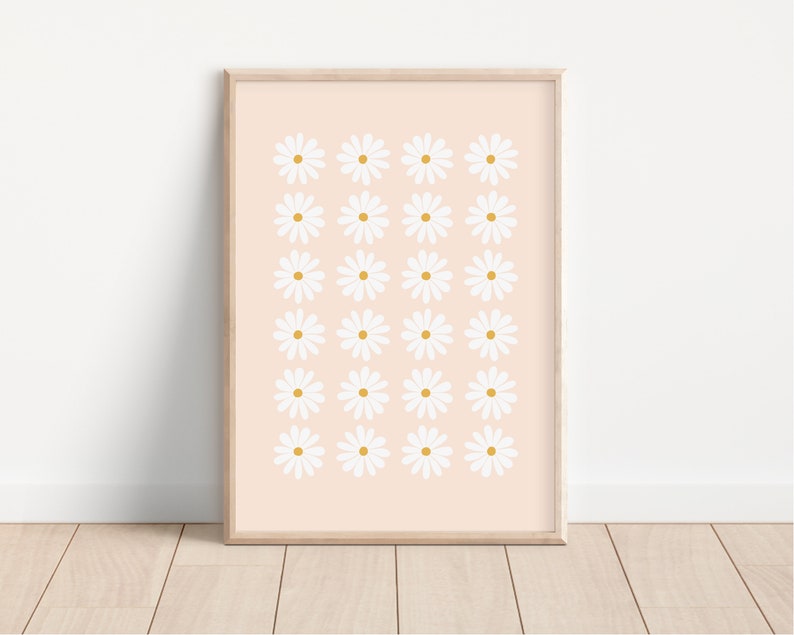 May include: A digital print featuring a repeating pattern of white daisies with yellow centers on a light pink background.
