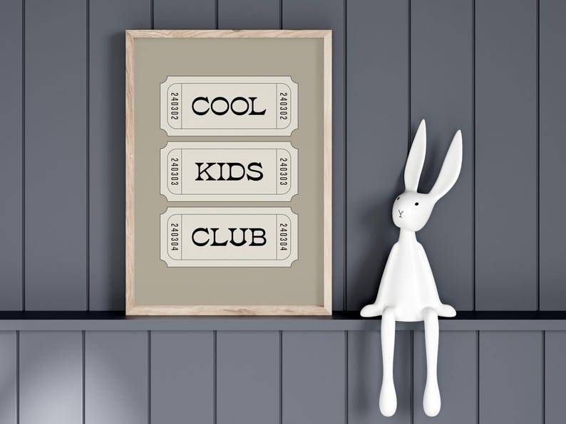 Typography wall art featuring three stacked ticket style designs with the words “Cool Kids Club” in bold black lettering on a neutral taupe background. Minimalist modern graphic print with a playful, retro inspired feel. This listing is for a digital download only. No physical print or frame included.