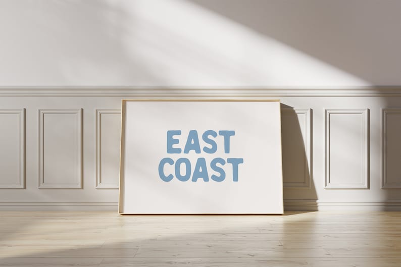 Minimalist typography wall art featuring the words “East Coast” in soft blue lettering on a clean off-white background. A modern, coastal-inspired print perfect for beach house decor, summer homes, living rooms, bedrooms or relaxed contemporary spaces. The simple design and airy colour palette create an effortless, laid-back seaside feel. This listing is for a digital download only. No physical print or frame included.