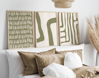 May include: Three framed abstract art prints with a green and white color scheme. The prints feature different geometric patterns and shapes.