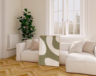 May include: A white sectional sofa with beige pillows in a modern living room. A large framed abstract print with green and white shapes hangs on the wall. A large green plant is in the corner of the room.