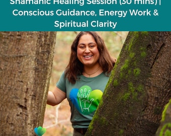 May include: A woman smiles, framed by trees, wearing a green t-shirt with a heart-shaped design. The shirt features a hand graphic and the words "Humans of Humanity." Text at the top reads "Shamanic Healing Session (30 mins) | Conscious Guidance, Energy Work & Spiritual Clarity."