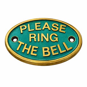 May include: An oval metal sign with a teal background and a raised gold border. The sign features the embossed gold text "PLEASE RING THE BELL" in the centre. Two circular mounting holes are positioned on the left and right sides of the sign. house door plaque, house door sign, cottage door sign, cottage door plaque, farmhouse door sign, farmhouse plaque, hotel door sign, hotel entry sign, hotel entrance sign, guesthouse sign, guest house sign, cafe door sign, cafe entry sign,
