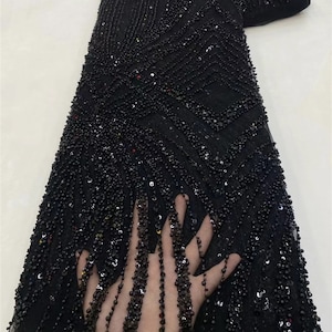 Black beaded lace fabric top