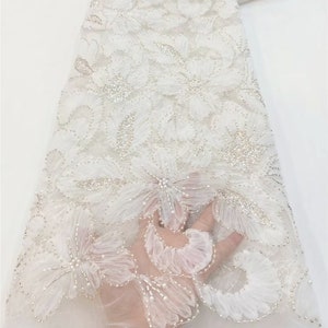 White tulle floral fabric, tube beads surrounding tulle flowers,sequin mesh,sequined tulle lace fabric with 3d florals for baby photography