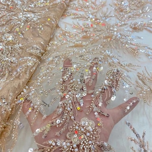 Embroidered floral and leaf tulle fabrics, heavy beaded lace fabrics, designer fabrics, wedding evening gown tulle, lace mesh