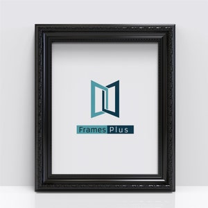 May include: Black picture frame with an ornate design. The frame is empty and has a white mount. The text "Frames Plus" is printed in blue below a stylized blue and teal logo.