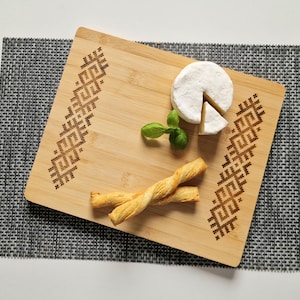 Engraved Chopping/Serving board with Baltic ornaments