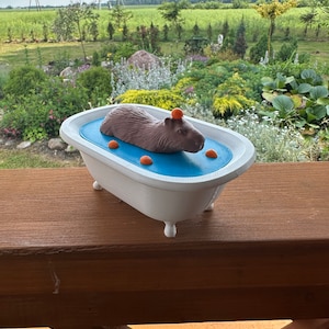 Lindo capibara para bañarse: figura original impresa en 3D con naranjas