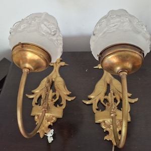 Pair of 2 wall lamps. Eagles