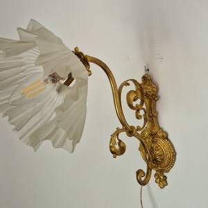 Wall lamp. Antique lamp with white frosted glass cover
