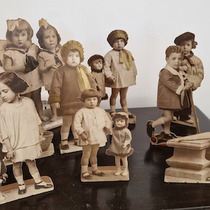 Vintage decoration — Lot of advertising figures from a children&#39;s photography studio, Valencia, ca. 1900–1920