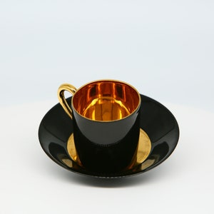 Vintage cup and saucer, spring, Limoges France. 24 carat gold. Early 20th century