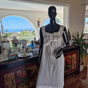 An antique nightgown of exquisite cut made of antique fine linen