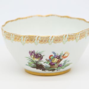 Vintage white porcelain bowl with gold edges and flower paint
