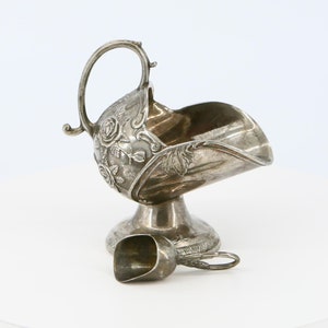 Vintage sugar bowl with spoon