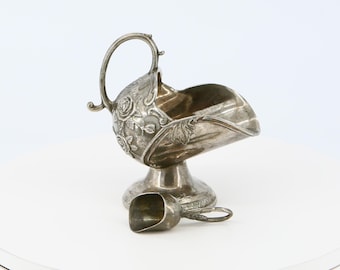Vintage sugar bowl with spoon