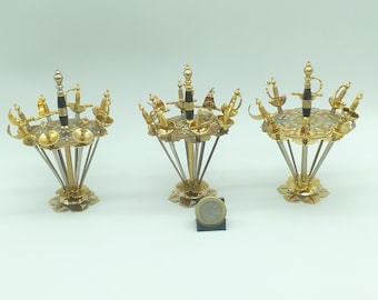 Vintage stand with miniature cocktail swords