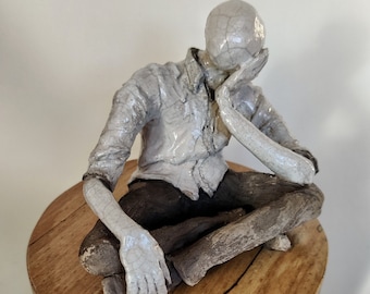 Ceramic sculpture handmade and raku fired.
