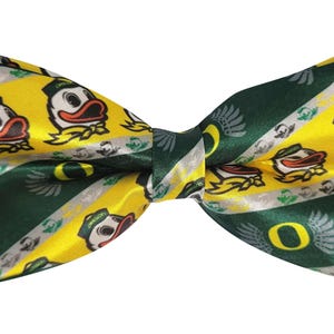 Pajarita de los Oregon Ducks de la Universidad de Oregon: accesorio oficial verde y amarillo de los Oregon Ducks