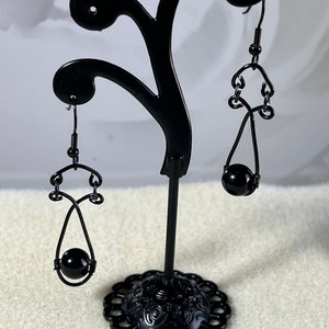 Enchanting 2 Inch Black Wire Wrapped Earrings