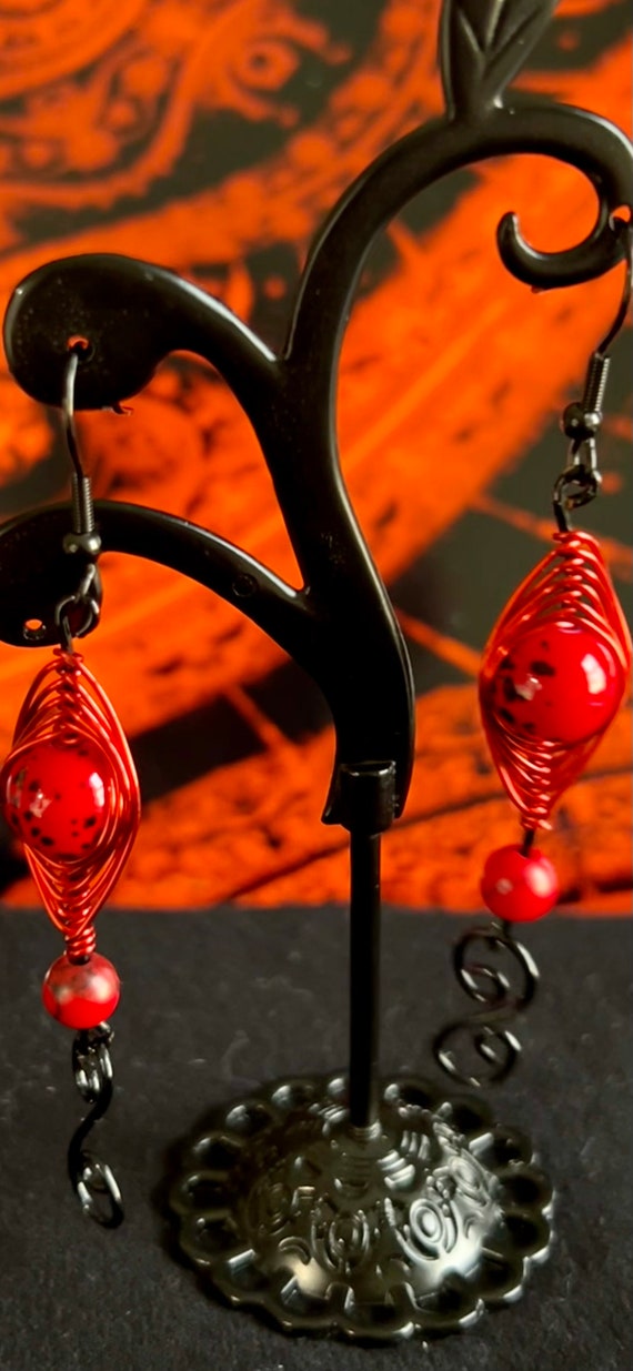 Red herring earrings clearance