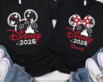 May include: Two black t-shirts with a white Mickey Mouse head and the text "Disney 2025" in red. One shirt has a red bow on the Mickey Mouse head and the text "Mommy" below the year.