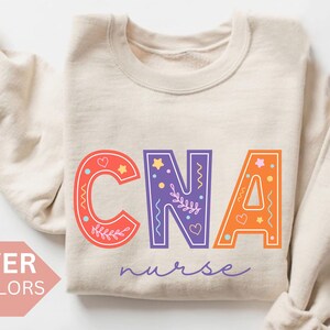 CNA Nurse Sweatshirt, CNA Nurse Shirt, CNA Nurse Gift, Nurse Appreciation Crewneck, Certified Nursing Assistants Pullover,Cna Doodle Sweater