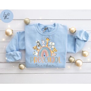 Sweatshirt voor kleuterjuf, shirt kleuterschool leraar regenboog, cadeau voor leraar kleuterschool, dierlijke trui kleuterjuf, shirt peuter afbeelding 9