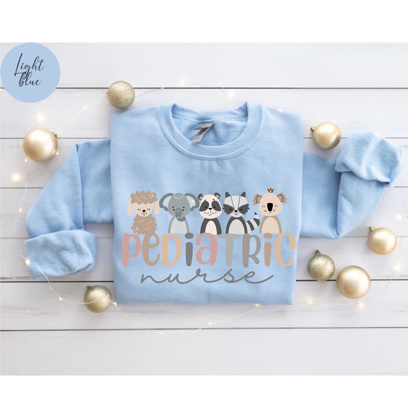 Sudadera de enfermería pediátrica, camisa de enfermera pediátrica de PICU, regalo de enfermera pediátrica, cuello redondo de enfermera pediátrica, suéter de enfermería lindo de PEDS, apreciación de enfermería imagen 8