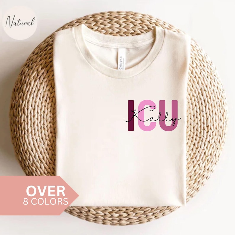 May include: A white t-shirt with the text "ICU Kelly" in pink and burgundy letters. The letters are stylized and have a gradient effect.