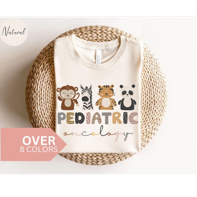 May include: A white t-shirt with a graphic design of animals and the text "PEDIATRIC ONCOLOGY".