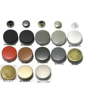 May include: Assortment of 12 round metal snaps in various colors and finishes, including rubber black, matte black, gun, nickel, matte silver, red, caramel, army green, blue gray, bronze, rose gold, matte gold, and satin nickel.