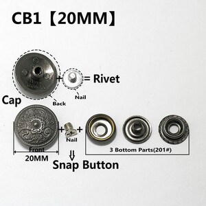Peut inclure: Un bouton pression argent&eacute; de 20 mm de diam&egrave;tre. Le bouton est compos&eacute; de trois parties : un capuchon, un clou et un fond. Le capuchon pr&eacute;sente un motif d&eacute;coratif sur le devant. Le clou sert &agrave; fixer le capuchon au fond. Le fond est compos&eacute; de trois parties : une base, un anneau et une rondelle. Le bouton est &eacute;tiquet&eacute; "CB1 (20MM)".