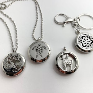 High Quality STAINLESS STEEL DIFFUSERS locket for your favorite essential oils. Non-toxic car air freshener.  Perfect gift! Choose style.