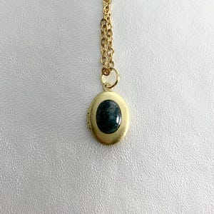 SMALL Antique brass LOCKET with Moss Agate cabochon on 16" necklace.  Perfect for Layering.