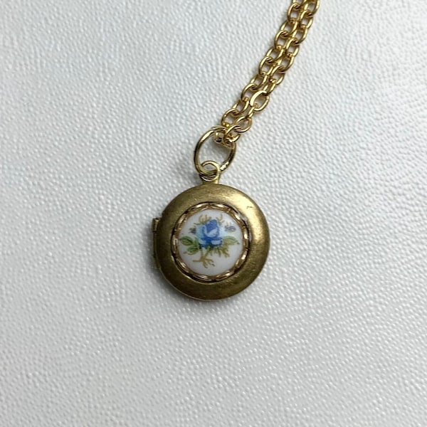 SMALL Antique brass LOCKET with vintage glass Limoge BLUE rose cabochon in lace edge setting on 16" necklace.