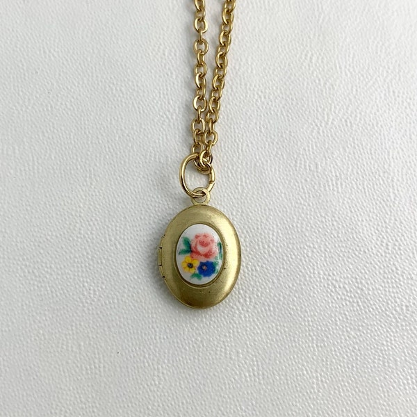 SMALL Antique brass LOCKET with Vintage Oval glass cabochon with Spring Flowers on 16" necklace.  Perfect for Layering.