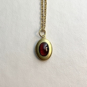SMALL Antique brass LOCKET with Natural Garnet cabochon on 16&quot; necklace.  Perfect for Layering.