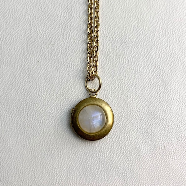 SMALL Antique brass LOCKET with Moonstone cabochon on 16" necklace.  Perfect for Layering.