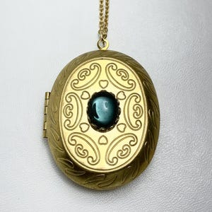 LARGE VINTAGE Victorian Style Brass Oval Locket with Vintage Montana Blue GLASS cabochon in lace edge setting on 24&quot;necklace Statement piece
