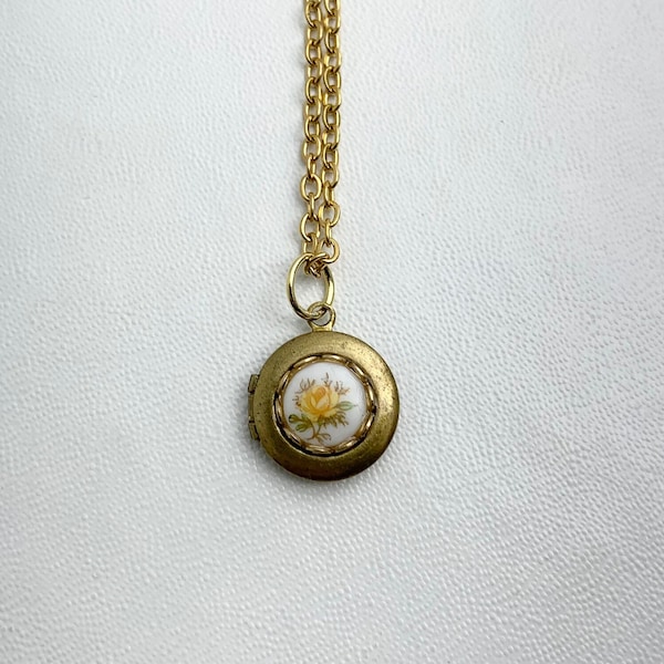 SMALL Antique brass LOCKET with Vintage glass Limoge yellow rose cabochon in lace edge setting on 16" necklace.  Perfect for Layering.