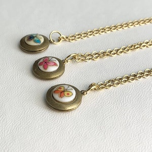 SMALL Antique brass LOCKET with Vintage glass Butterfly cabochon on 16&quot; necklace.  CHOOSE Blue, Pink, or Yellow Butterfly.