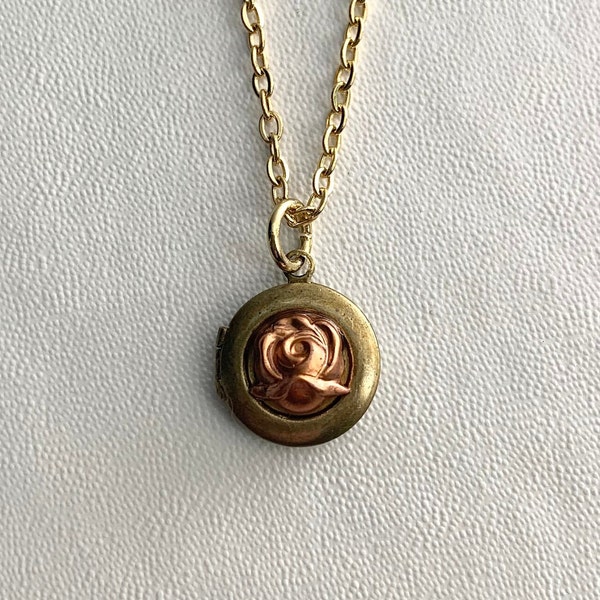 SMALL Antique brass LOCKET with Vintage die struck solid red brass rosette cabochon on 16" necklace.  Perfect for Layering.