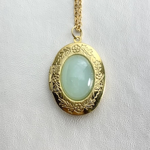 VINTAGE Style Brass Oval Locket with Vintage Aqua blue GLASS cabochon on 18&quot; necklace.
