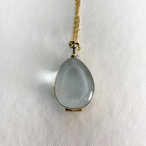 DEEP Antique style Brass and Glass Photo or Floating Locket on 18&quot; necklace. For photos, small mementos, hair.